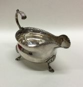 A good George III silver sauce boat with crimped r