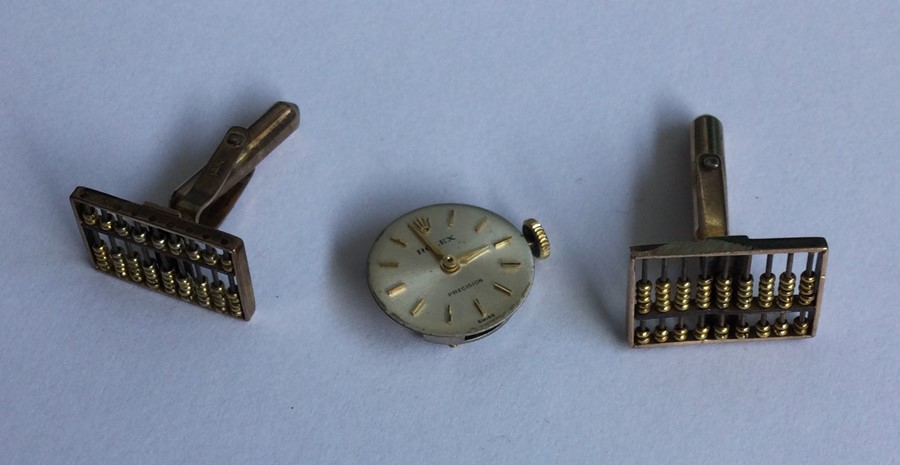 ROLEX: A small lady's watch movement together with