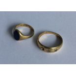 A small 18 carat gold signet ring together with a