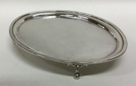 EDINBURGH: A Georgian silver oval salver on reeded