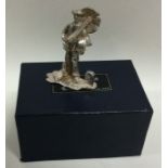 A cast silver figure of a chimney sweep in present