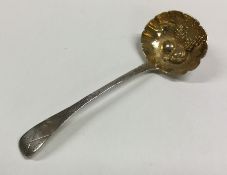 A George III silver berry ladle with gilt bowl. Lo