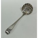 A Victorian silver sifter spoon with pierced bowl.