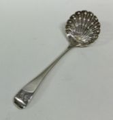 A Victorian silver sifter spoon with pierced bowl.