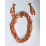 A good Continental pearl and coral twist necklace