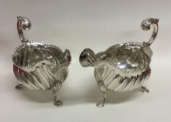 A good pair of heavy George III silver sauce boats