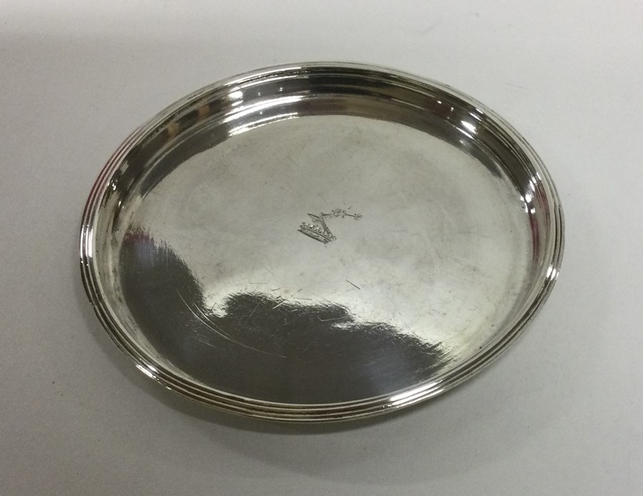 DUBLIN: A circular crested tray with reeded border
