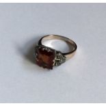 A rose diamond mounted ring in gold claw mount. Ap