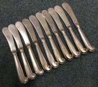 A heavy set of ten silver bladed and pistol handle