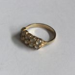 An 18 carat gold two row ring. Approx. 2 grams. Es