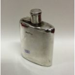 An Edwardian silver hip flask of typical form. Lon