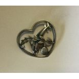 GEORG JENSEN. A stylish silver brooch in heart sha