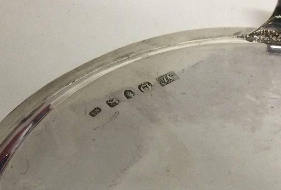 A Georgian silver salver of circular form on sprea - Image 3 of 3