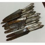 A heavy set of ten Continental silver knives with