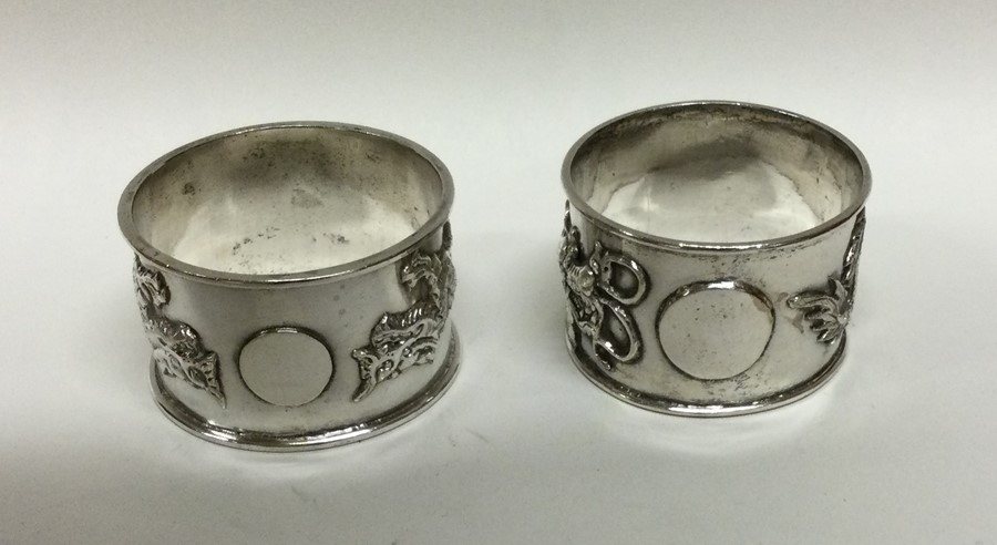 A good pair of chased silver napkin rings decorate - Image 2 of 2