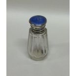 A small silver and enamelled scent bottle. Birming