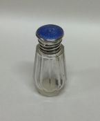 A small silver and enamelled scent bottle. Birming