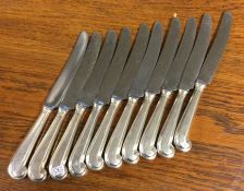 A set of ten silver pistol handled dessert knives.