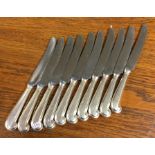 A set of ten silver pistol handled dessert knives.