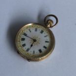 A small lady's 14 carat fob watch. Est. £80 - £120