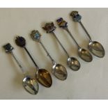 A collection of six good silver souvenir spoons. V