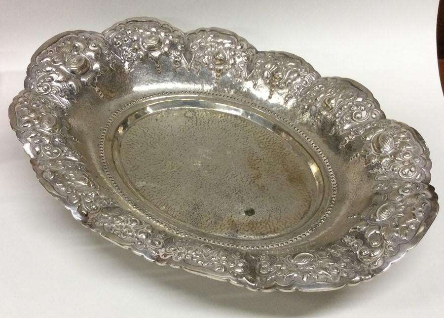 A large Continental silver plated bread basket on