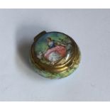 A small porcelain mounted compact. Approx. 27 gram