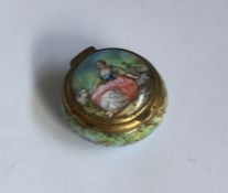 A small porcelain mounted compact. Approx. 27 gram