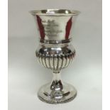 A George III silver half fluted goblet on spreadin