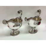 A good pair of Georgian silver sauce boats with ga