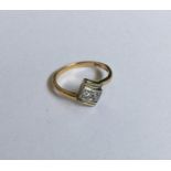 A good 18 carat gold and platinum two stone diamon