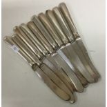 A set of ten silver mounted dessert knives. Approx