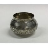 An Egyptian silver bowl with engraved decoration.