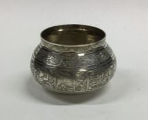 An Egyptian silver bowl with engraved decoration.
