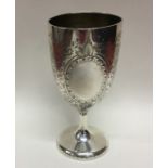 EXETER: A heavy Victorian silver goblet with flora