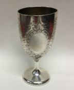 EXETER: A heavy Victorian silver goblet with flora