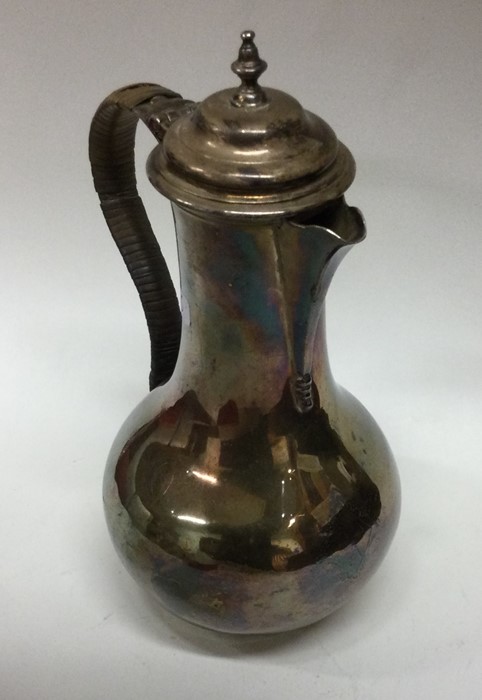 A George II baluster shaped silver jug with cane h - Image 2 of 3