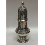 A Georgian style silver sugar caster. Birmingham.