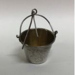 A Russian silver tea strainer of tapering form. Ap