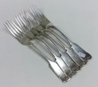 A set of five fiddle pattern silver table forks. S