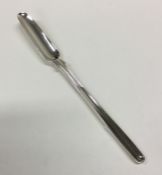 A Victorian silver crested marrow scoop. London 18