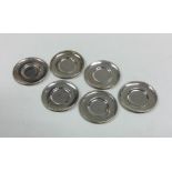 A set of six miniature silver dinner plates with s