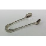 A pair of Victorian silver sugar tongs. Birmingham