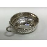 A large silver wine taster with serpent handle. Ci