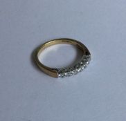 A seven stone diamond half eternity ring in 18 car