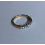 A seven stone diamond half eternity ring in 18 car