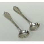 A pair of heavy crested silver salt spoons. Sheffield. B