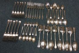 A heavy silver old English and rat tail cutlery se