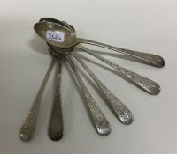 A collection of silver bright cut teaspoons. Vario