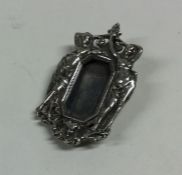 A miniature silver Art Nouveau brooch depicting se